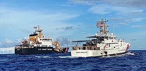 The crews of the Coast Guard Cutters Juniper and Joseph Gerczak return to Honolulu after completing a 42-day patrol in Oceania in support of Operation Aiga, March 7. U.S. COAST GUARD (cropped).jpg