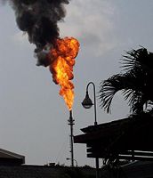 Flare at PTT facility in Thailand. PTT is the national oil and gas company.