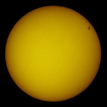 Image of the solar transit of the International Space Station and Space Shuttle Atlantis 50 minutes before docking, taken from the area of Madrid (Spain) on May 16th 2010 at 13h 28min 55s UT.